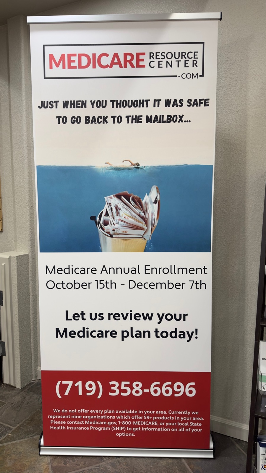 A Medicare Resource Center banner in the office about the Annual Enrollment Period, October 15 to December 7